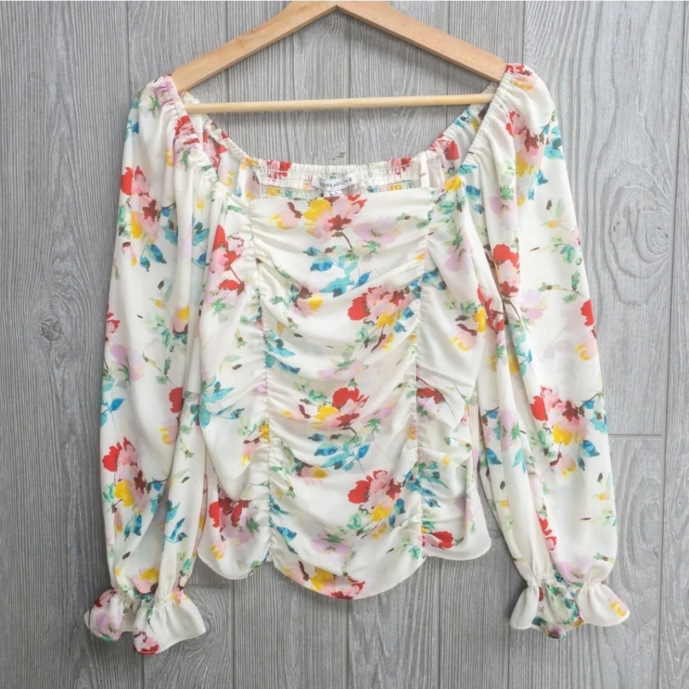 New with tags! Cute romantic floral long sleeve top!